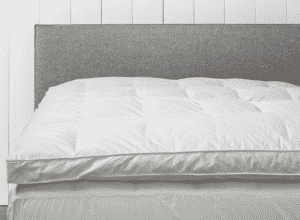 White Feather Mattress on bed