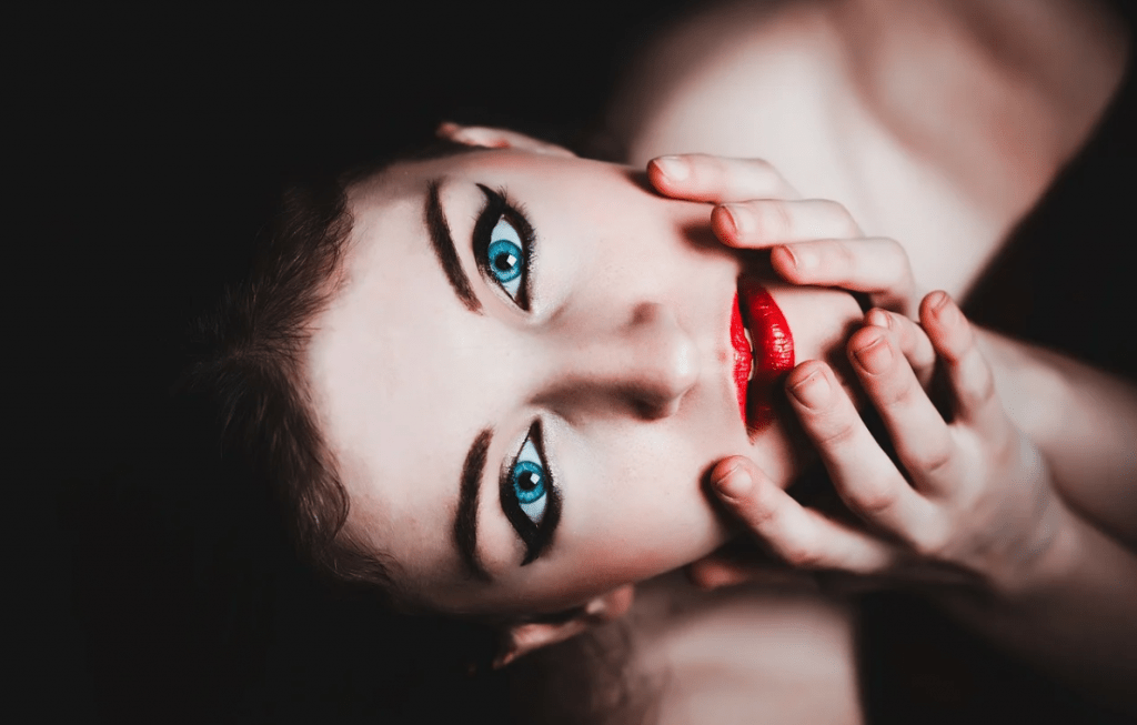 women with colored eyes and red lipstick