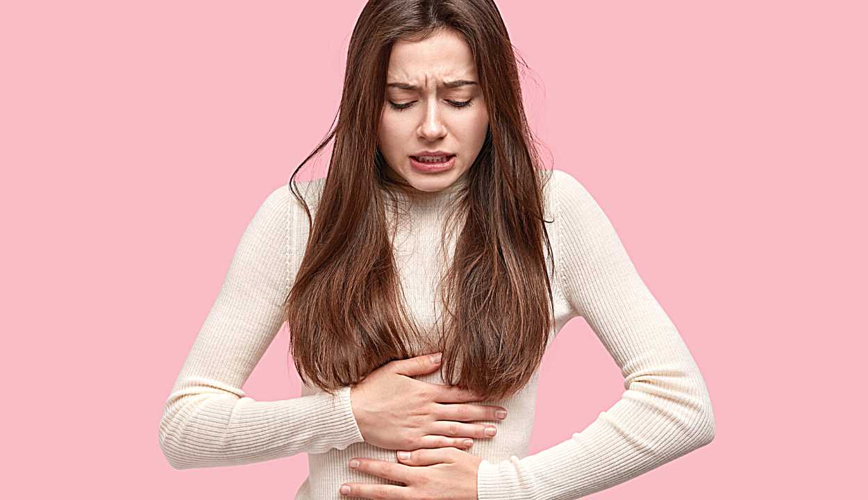 a girl having abdominal cramps