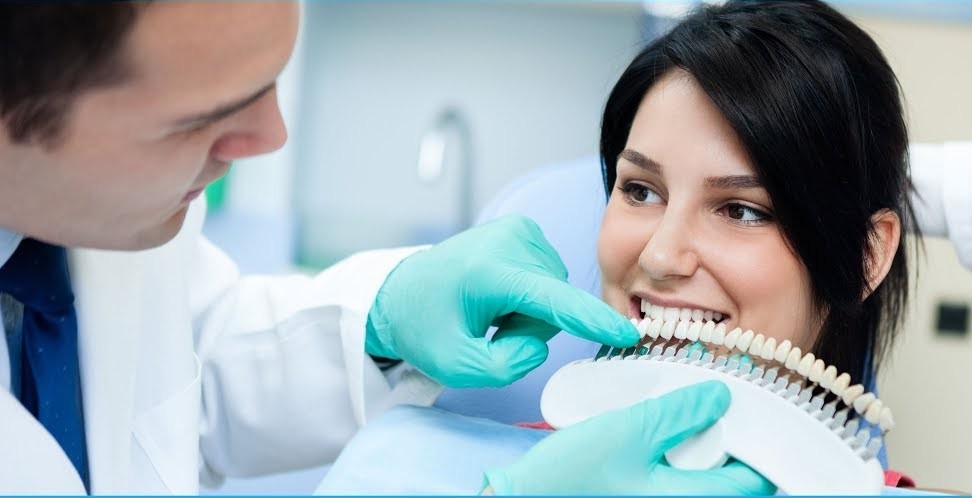 A Girl Consultation with dentist for teeth whitening