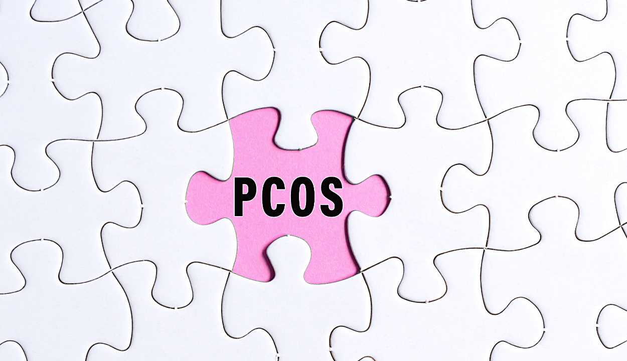 PCOS text written on a jigsaw puzzle