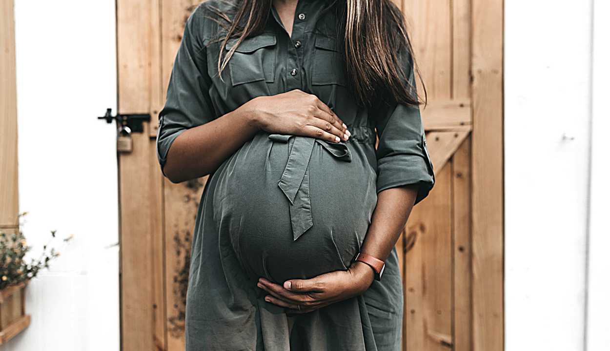 a pregnant girl with a baby bump