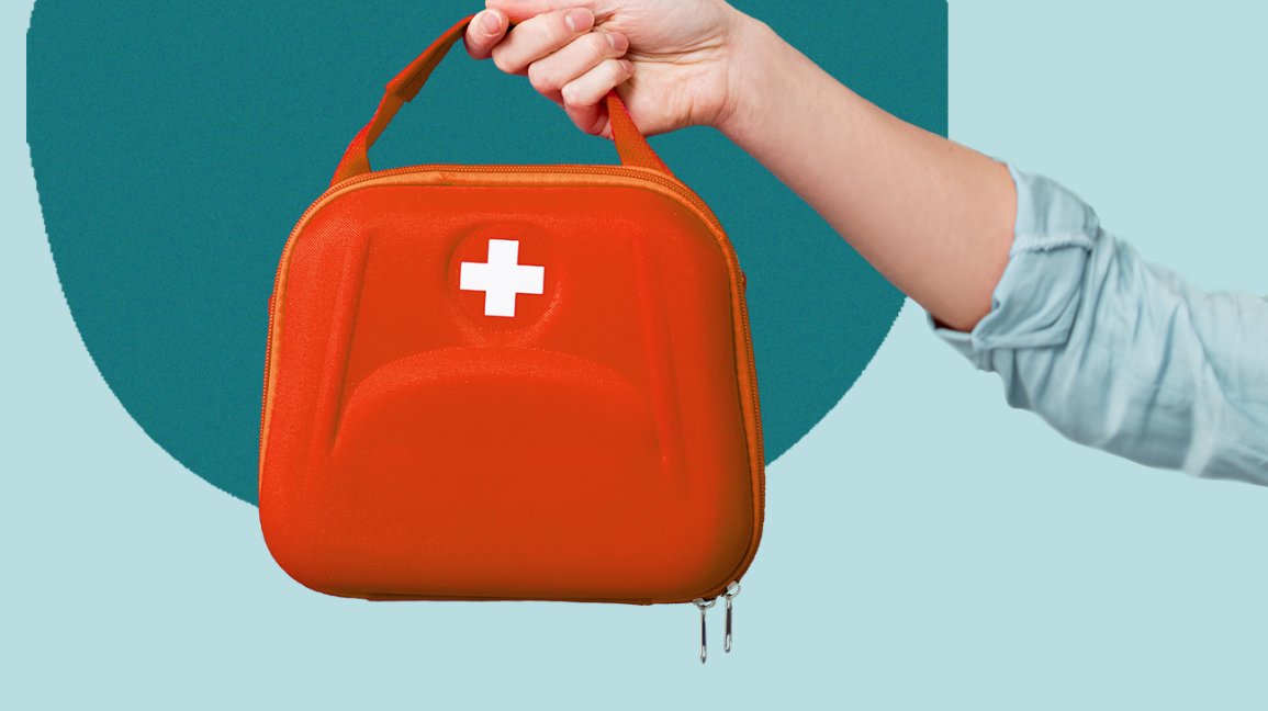 First Aid Kit Case in a womens hand