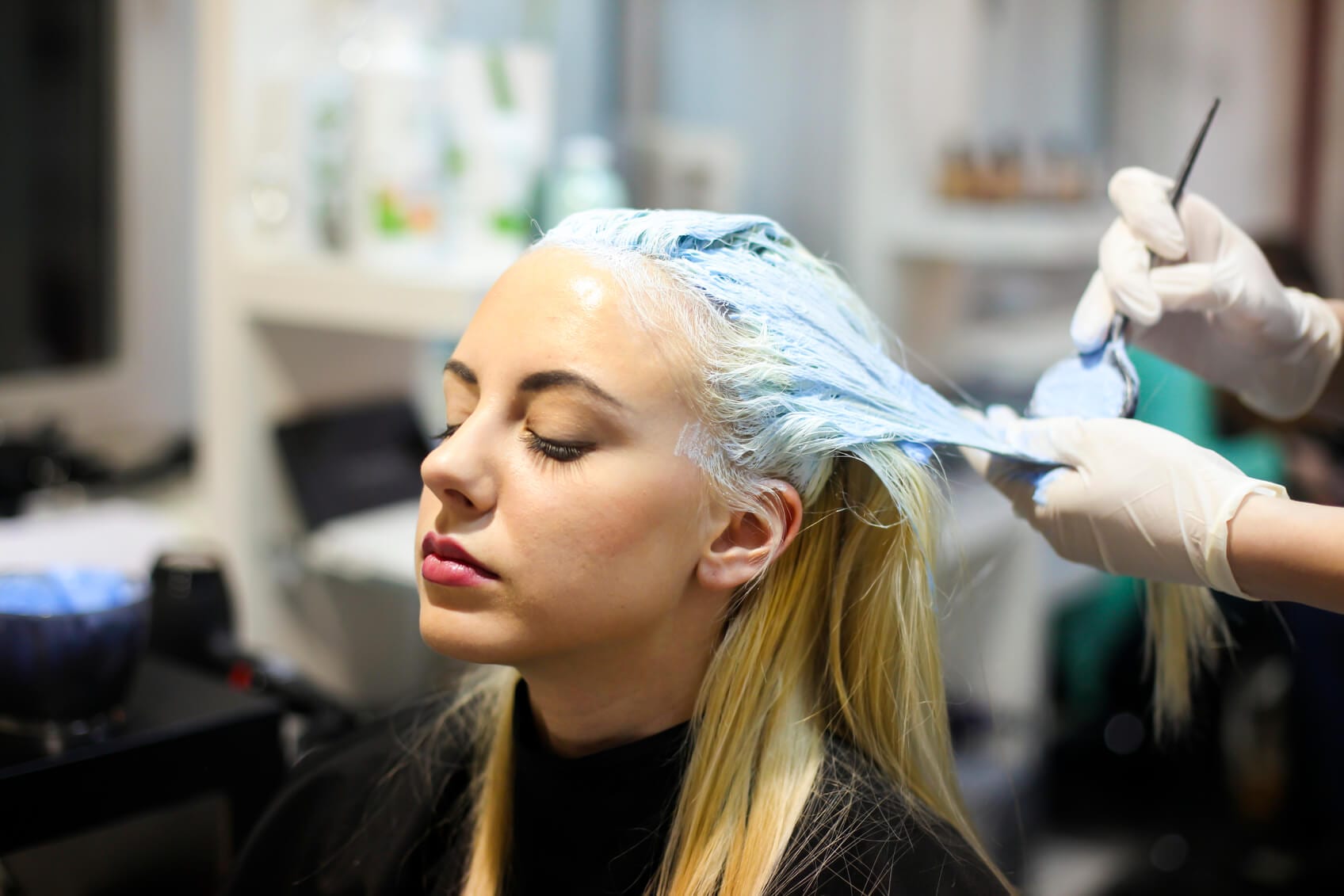 A Beautician Re-Dye Hairs of a Girl