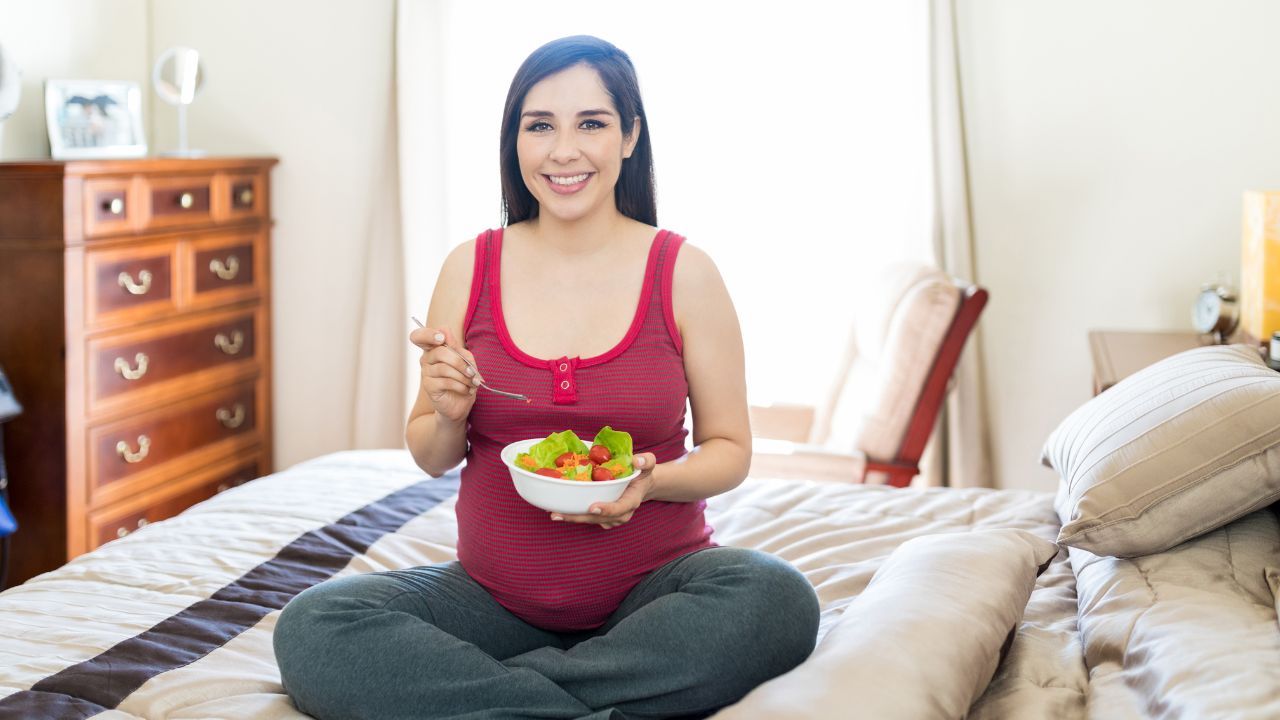 Girl eating healthy food during pregnancy 